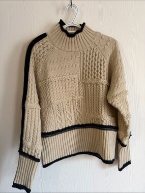 Cream Cable-Knit Turtleneck Sweater with Black Trim